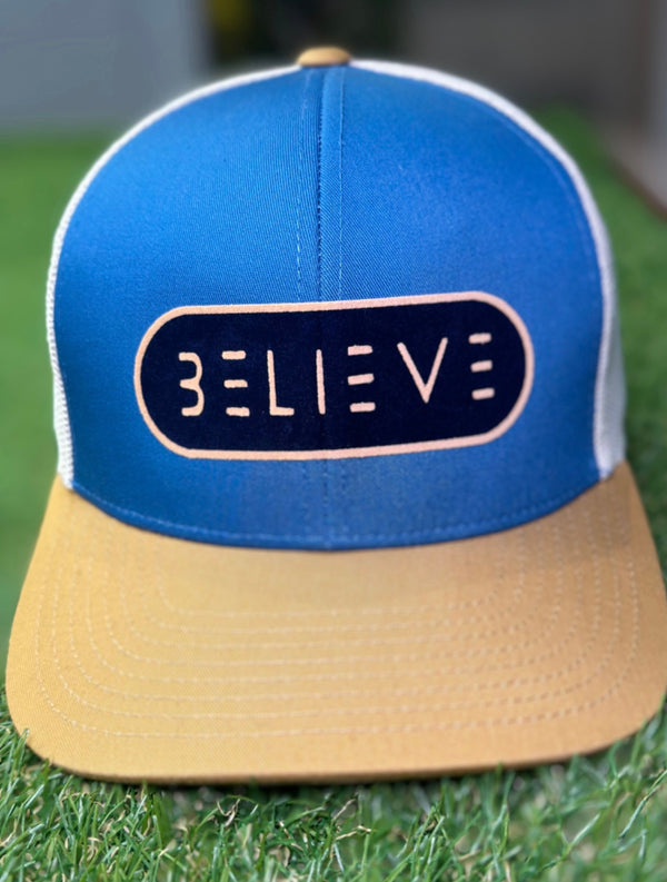 Blue and Camal Believe Trucker