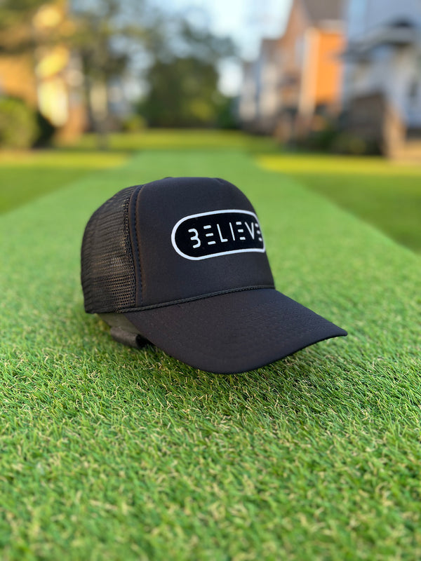 Black and White BELIEVE Trucker Hat